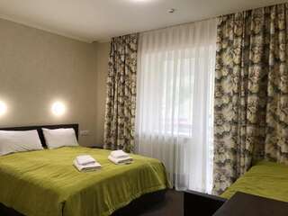 Отель Private Rooms in Grofa Hotel Буковель Трехместный номер-7
